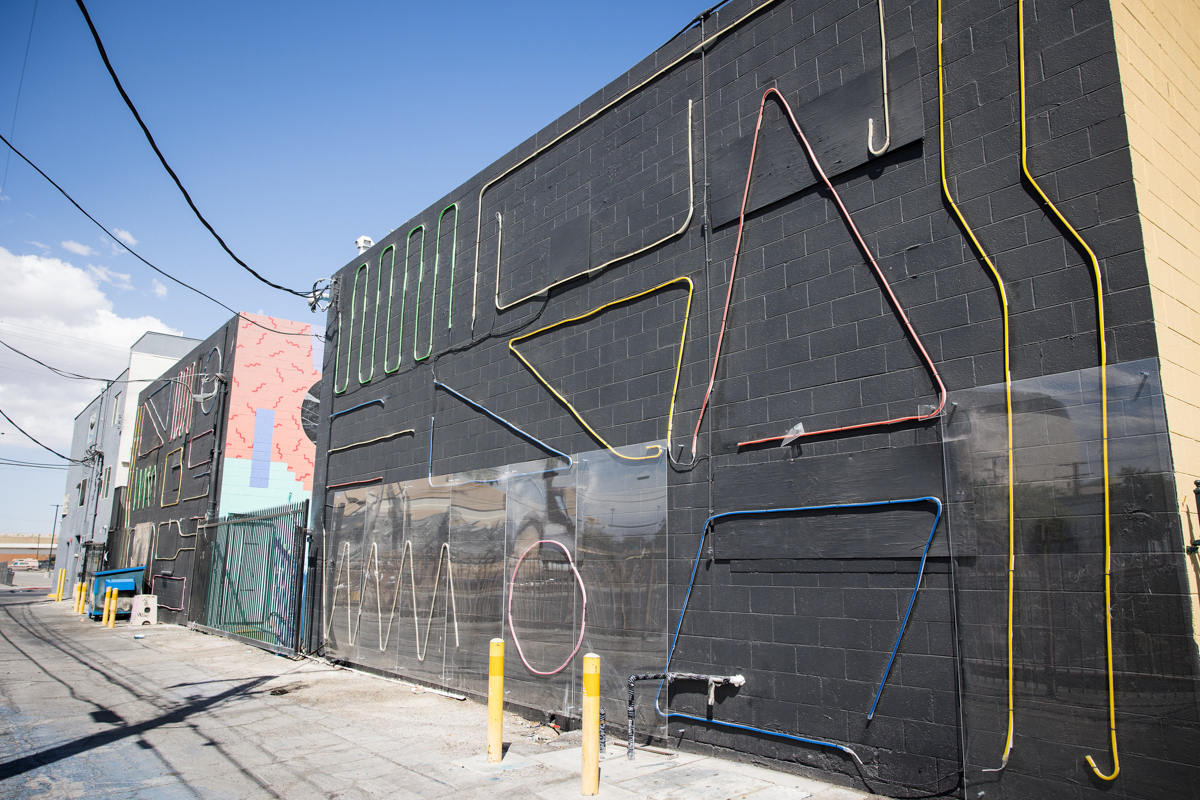 Mural made of neon lights on the side of a building in Las Vegas.