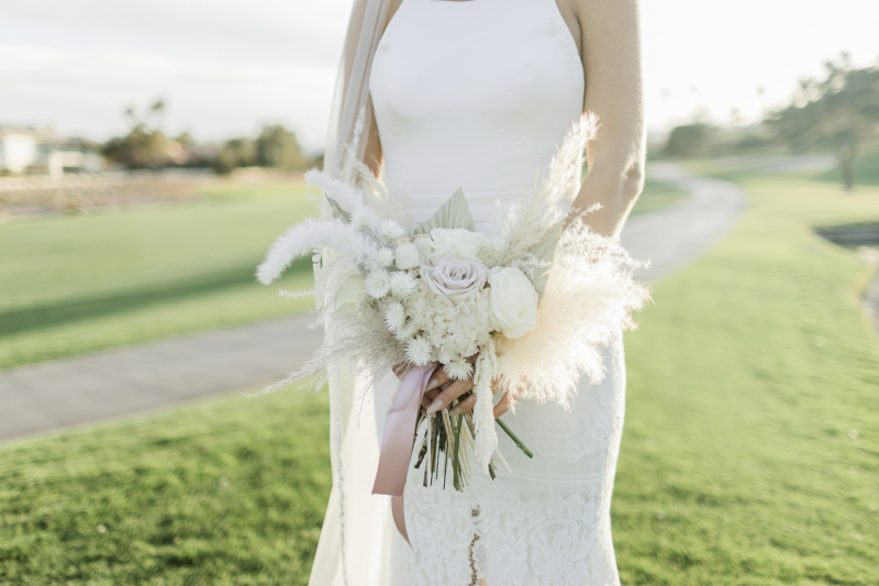 Close up of white wedding bouquet.