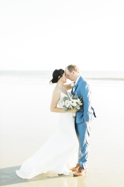 Couple hugging on Coronado Beach.