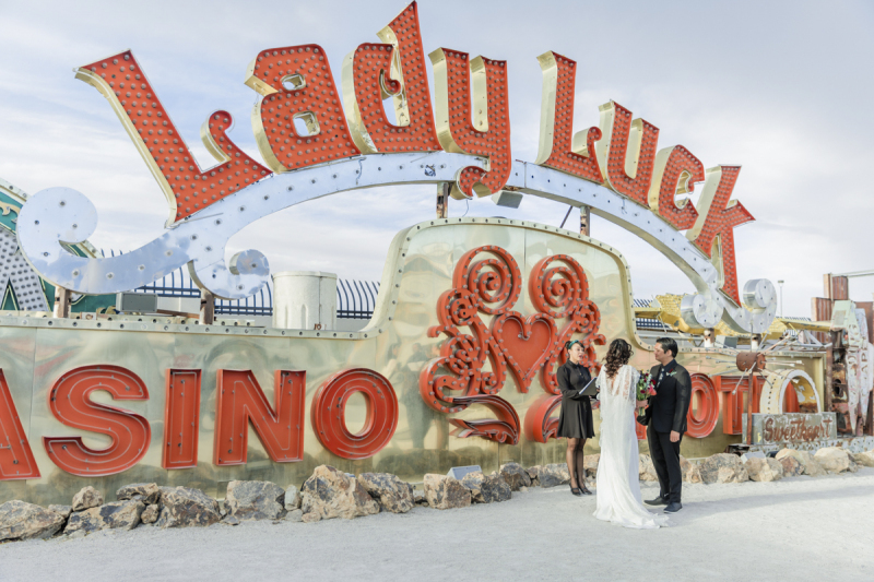 Ceremony in front of Lady Luck sign at Neon Museum.