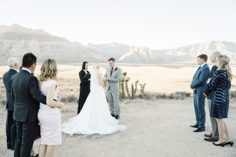 Wedding ceremony with guests at Red Rock Canyon Overlook.