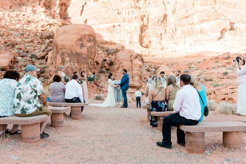 View from end of ceremony aisle to the couple at the ceremony.