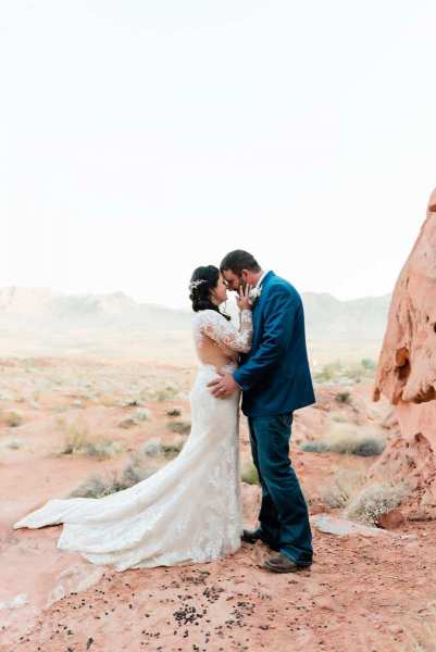 Couple standing face to face at Valley of Fire wedding.