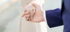Woman showing off ring after getting engaged.