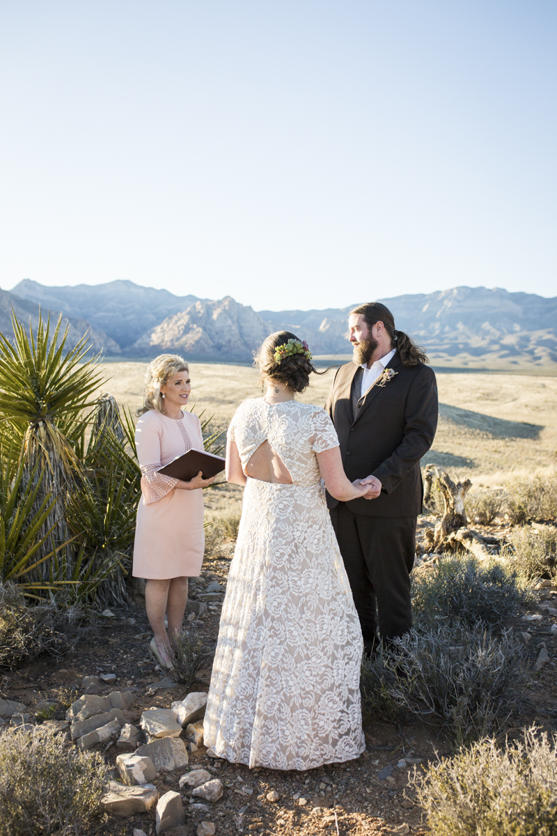 Brooke and John in front of officiant.