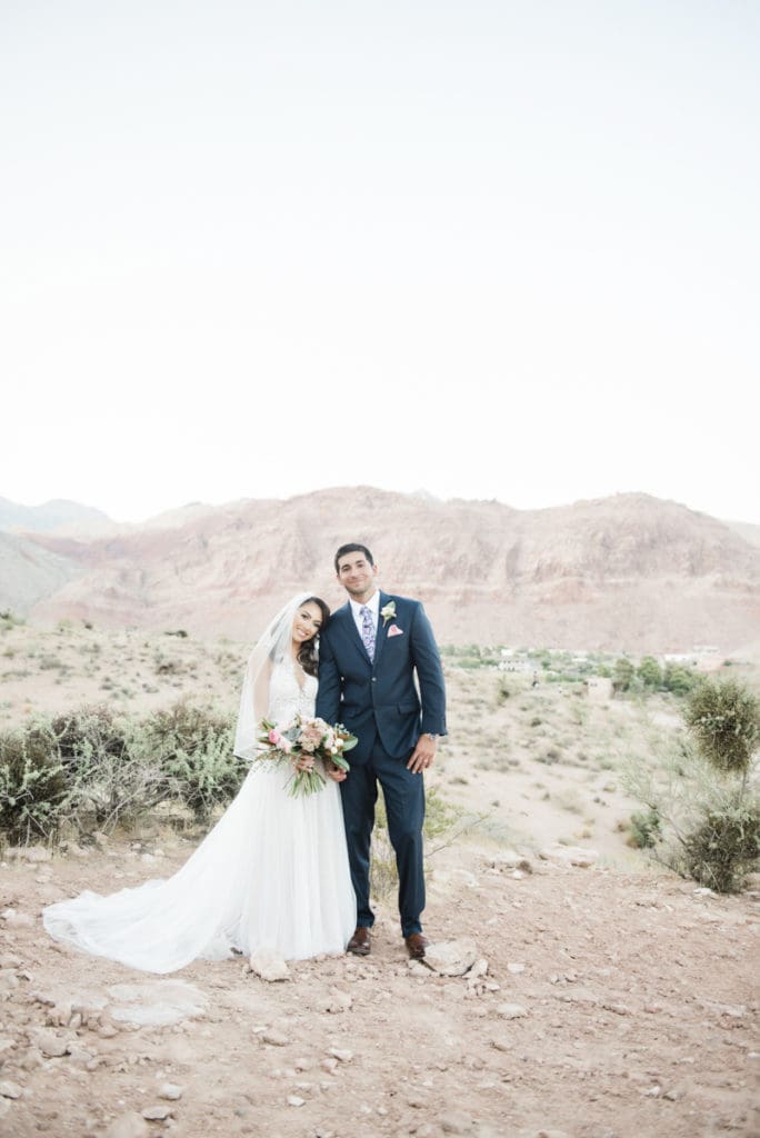 Couple standing in mountain landscape