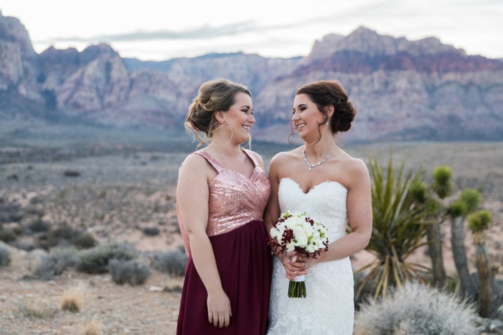 Bride + Bridesmaid in a Summer Weddings in Las Vegas