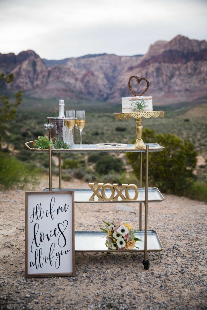 Mini reception set up with sign in front.