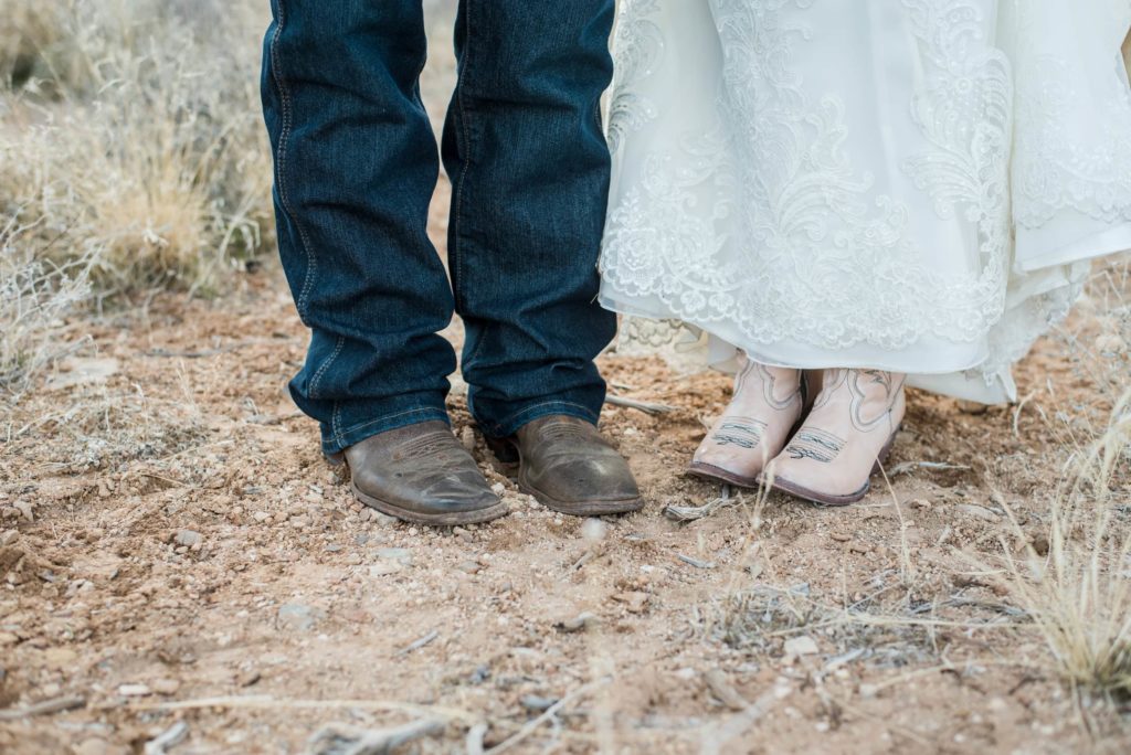 Bride and groom in boots.