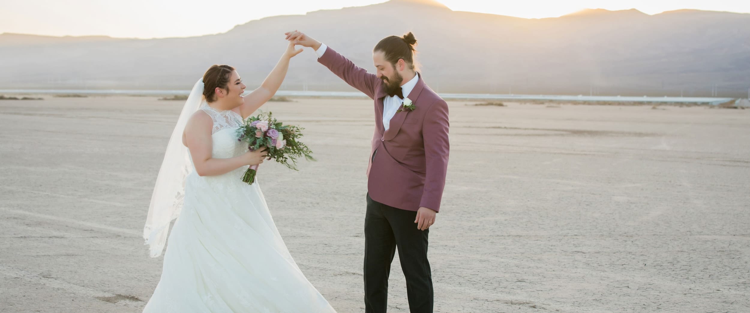 Bride and groom dancing in the Dry Lake Bed in Las Vegas.