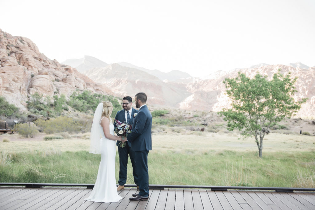 Eloping couple on boardwalk at Red Spring in Red Rock Canyon.