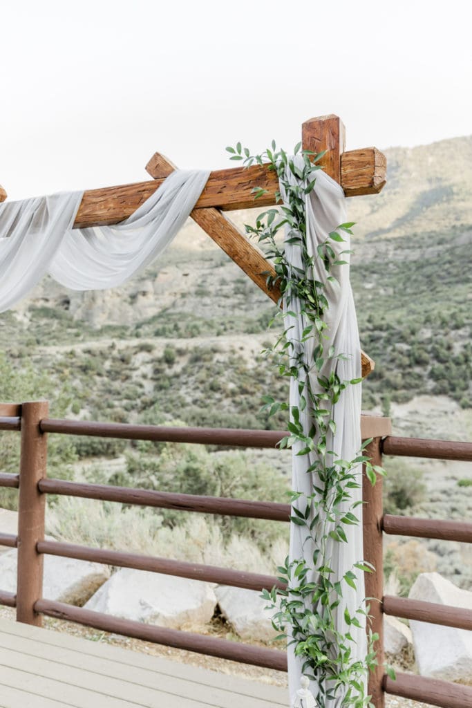 Wooden arbor with leafy decoration