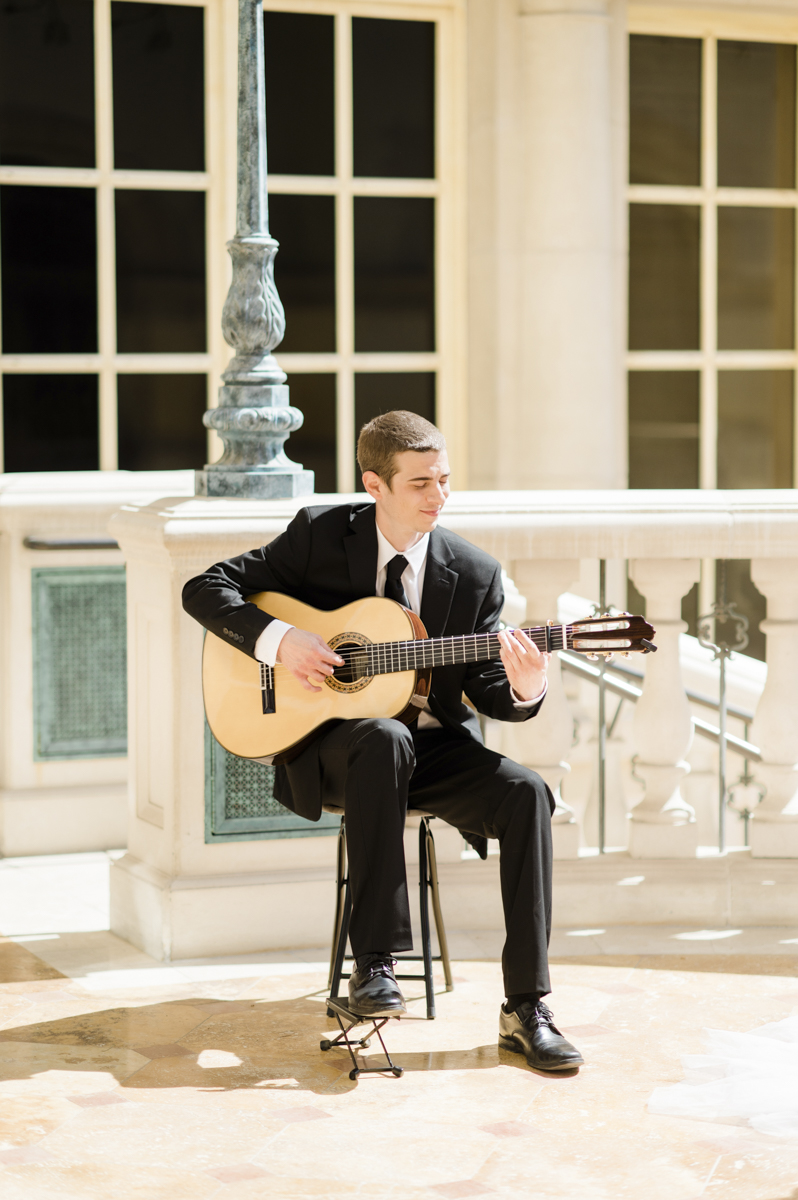 Live wedding music guitarist.