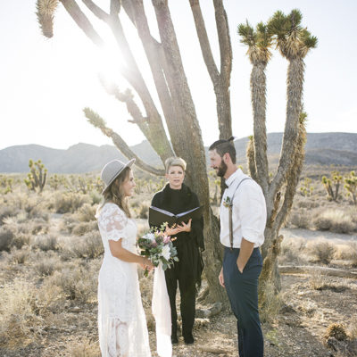 Ceremony in front of a joshua tree.